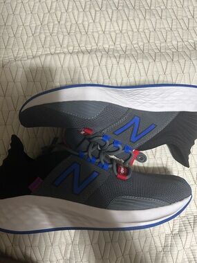 New Balance Gray Athletic Sneakers with Blue & Red Accents